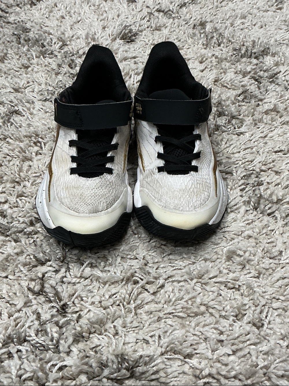 Nike Kids White and Black Sneakers with Gold Trim